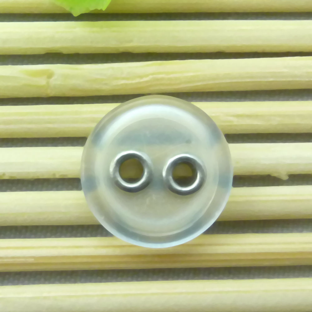 厂家直销两眼圆形透明树脂鸡眼组合钮扣，A012