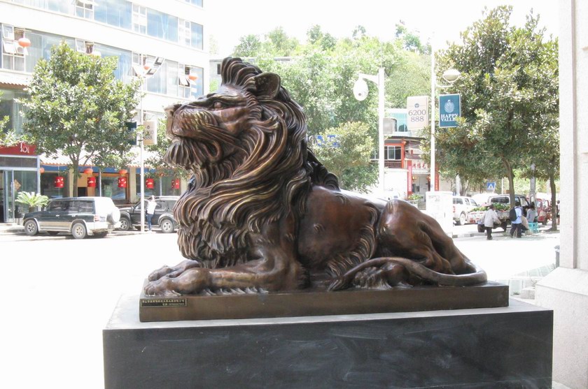 铜卧狮广东铸造铜卧狮子