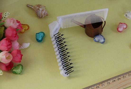 一次性塑料酒店梳子 厂家批发一次性折叠梳子 长柄一次性梳子