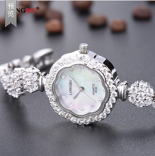 型号:6035 时尚奢华水晶镶钻手链表绕圈贝母表盘女士手表防水石英表