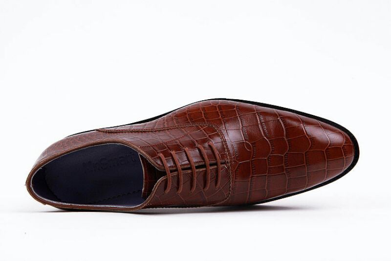 黑龙江大型皮鞋男鞋制造厂家 七台河男士皮鞋批发出售蛇纹时尚皮鞋