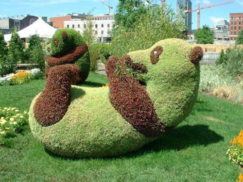 仿真熊猫绿雕 绿色熊猫雕塑 假动物造型
