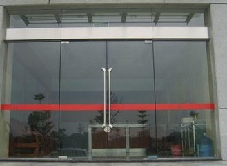 北京维修玻璃门地弹簧故障维修