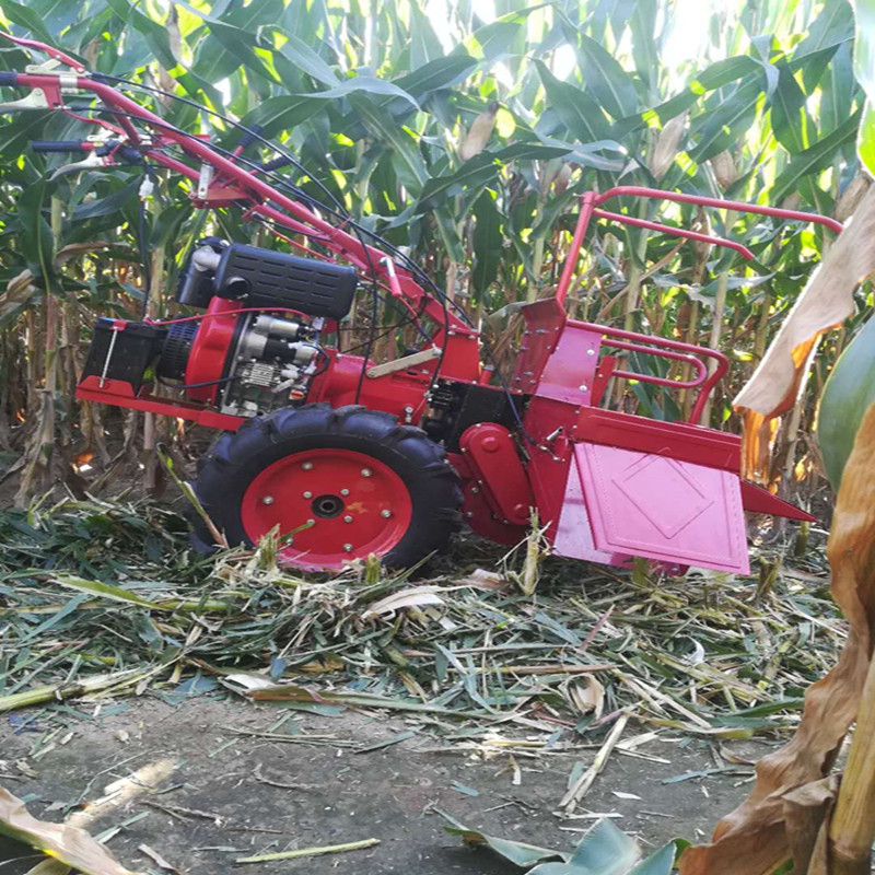 12马力手扶拖拉机带玉米收获机 家用小型玉米收割机