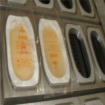 武汉米饭盒包装机 全自动盒装自热米饭真空封口机 塑料盒封口机厂家