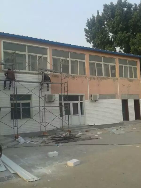 厂家轻钢别墅板旧房室外墙面改造板仿木纹民房外墙装饰PVC板广州