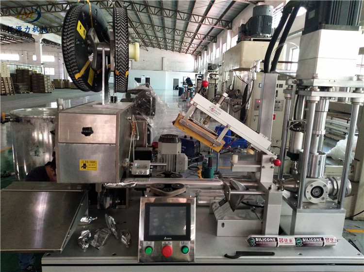 珠海硅酮膠包裝機-玻璃膠全自動軟包裝機生產廠家-恒源力機械設備