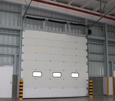 天津市万利盈金属门窗有限公司 天津保温电动提升门规格 有实力的工业提升门安装
