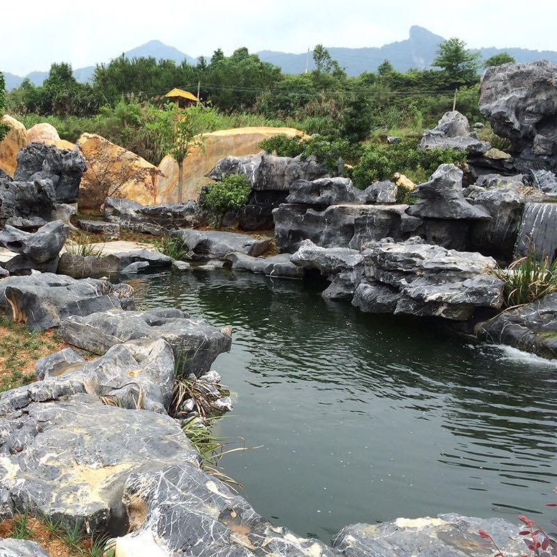 小区黑山太湖石驳岸造景不一样景色