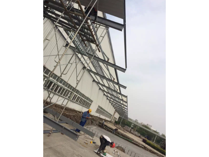 南通定做钢构雨棚建造公司 上海拓立建筑装饰工程供应