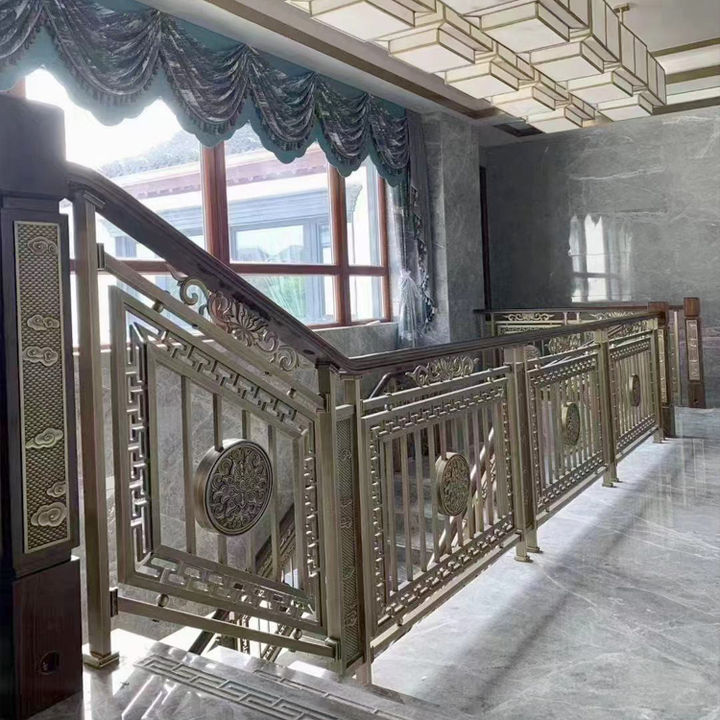 杭州钛金铜楼梯围栏 酒店弧形铜楼梯扶手安装效果