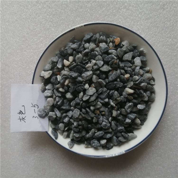 批发 洗米石 灰黑色砾石洗米石 水磨石材料胶粘石米