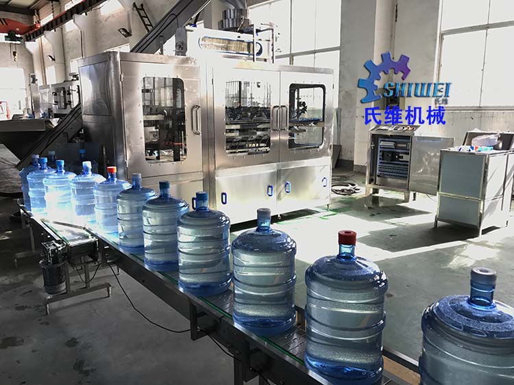 大桶水全自动包膜机 桶装水一次性塑料膜套袋设备 小型桶装水裹膜机械