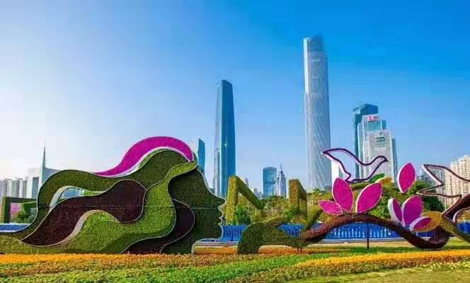 青海海东景区大门口绿雕凤凰、孔雀仿真植物绿雕制作