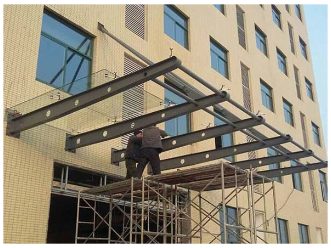 宁波订做钢结构雨棚公司 上海拓立建筑装饰工程供应