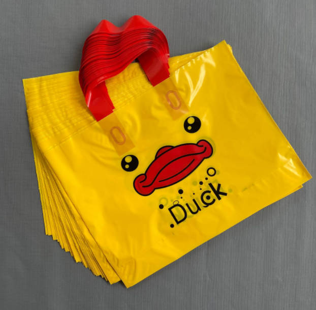 新款网红服装店手提袋 衣服袋子塑料袋 礼品袋购物袋 卡通礼品饰品袋