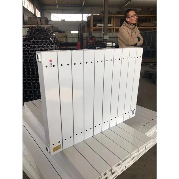 旭冬钢制散热器钢三柱中600的暖气片标准工况，钢三柱暖气片规格尺寸，钢三柱暖气片单片的重量