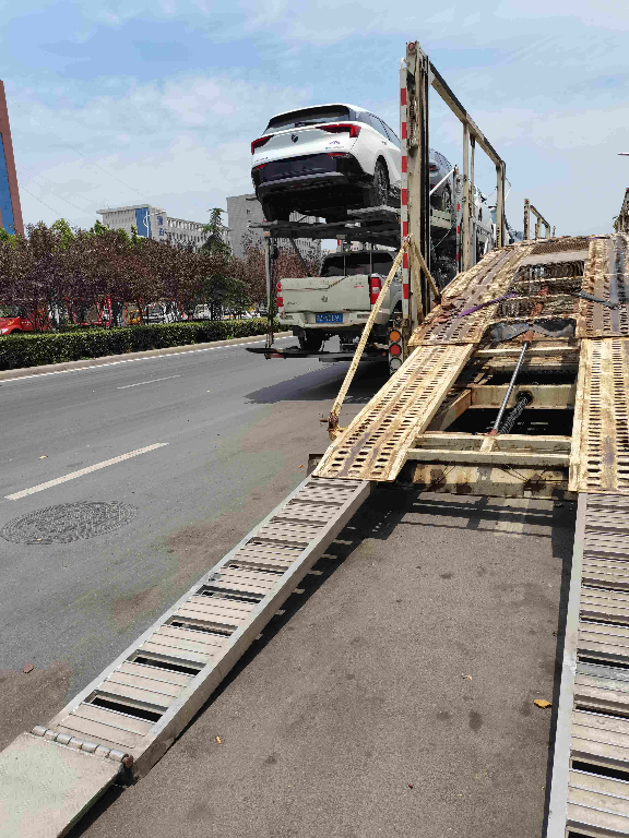 郑州到沙雅轿车拖运往返运输 资质齐全 异地上门取车