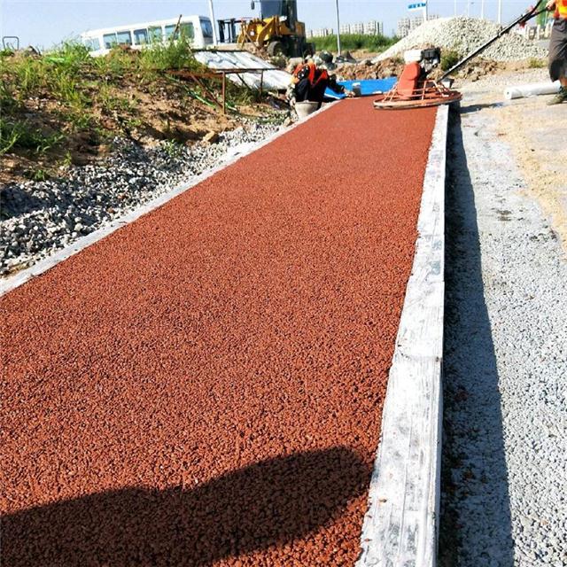 真石丽露骨料透水混凝土路面施工新工艺 昆山固化剂与施工模具厂家